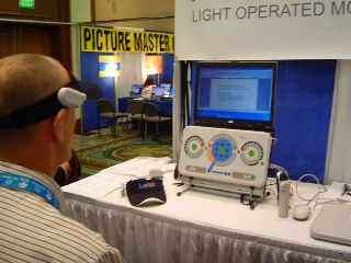 Lomak light activated keyboard being used with a head pointer